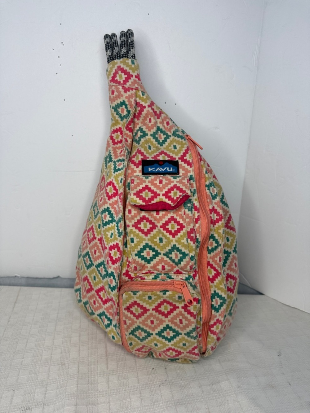 Kavu Geometric Print Sling Bag - Coral, Teal, Cream
